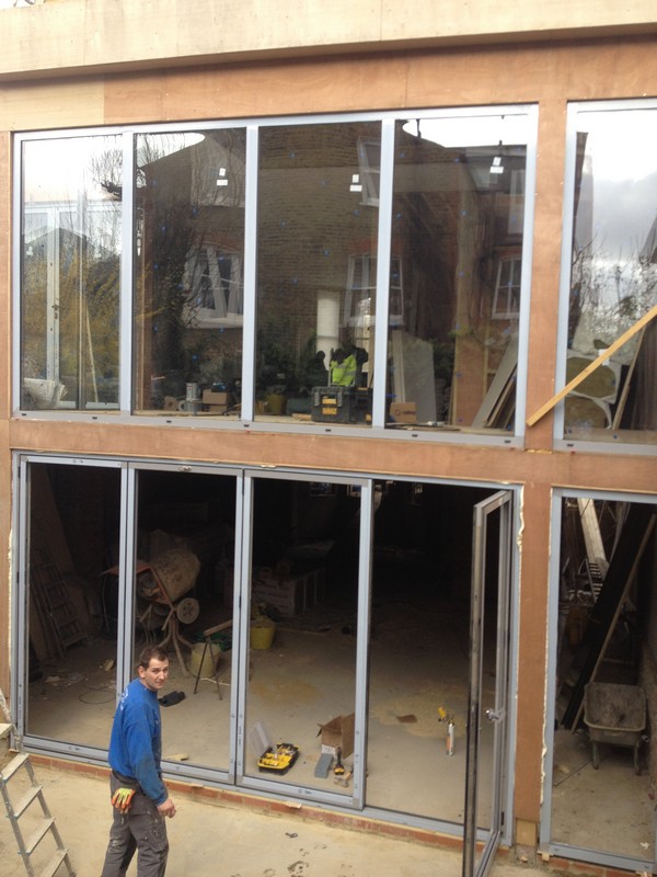 Aluminium bi-fold doors with two-storey glazing in Abingdon