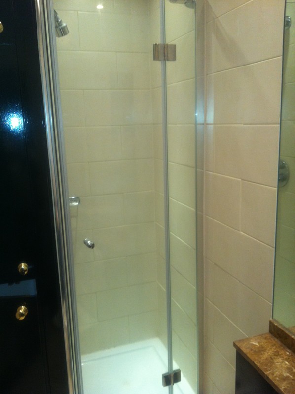 Frameless glass shower enclosure with chrome fittings in Abingdon