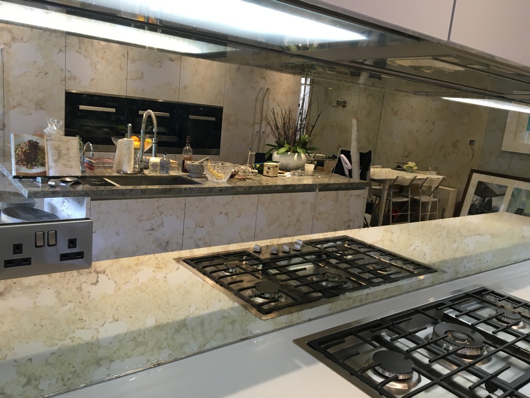 Mirror glass splashback in Abingdon luxury kitchen
